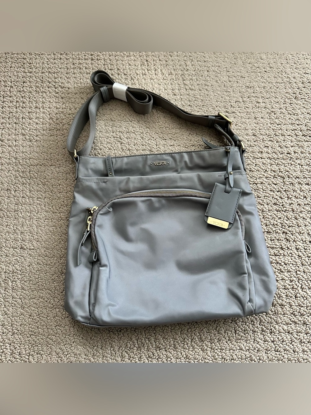Tumi silver Gray Nylon Crossbody with Front Zip Pocket and Luggage Tag